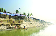 রৌমারিতে নদী ভাঙন রোধে তিন কিলোমিটার মানববন্ধন